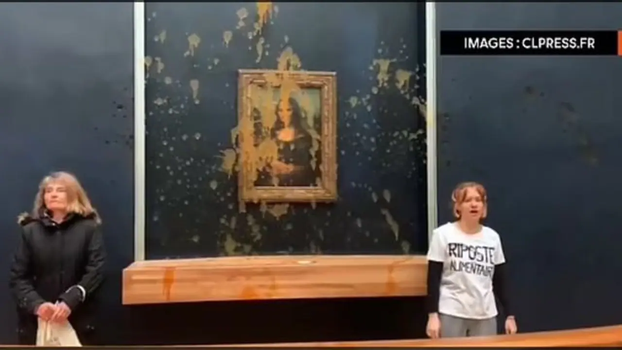 Climate activists splash tomato soup on iconic Mona Lisa painting in Paris; video goes viral (WATCH)