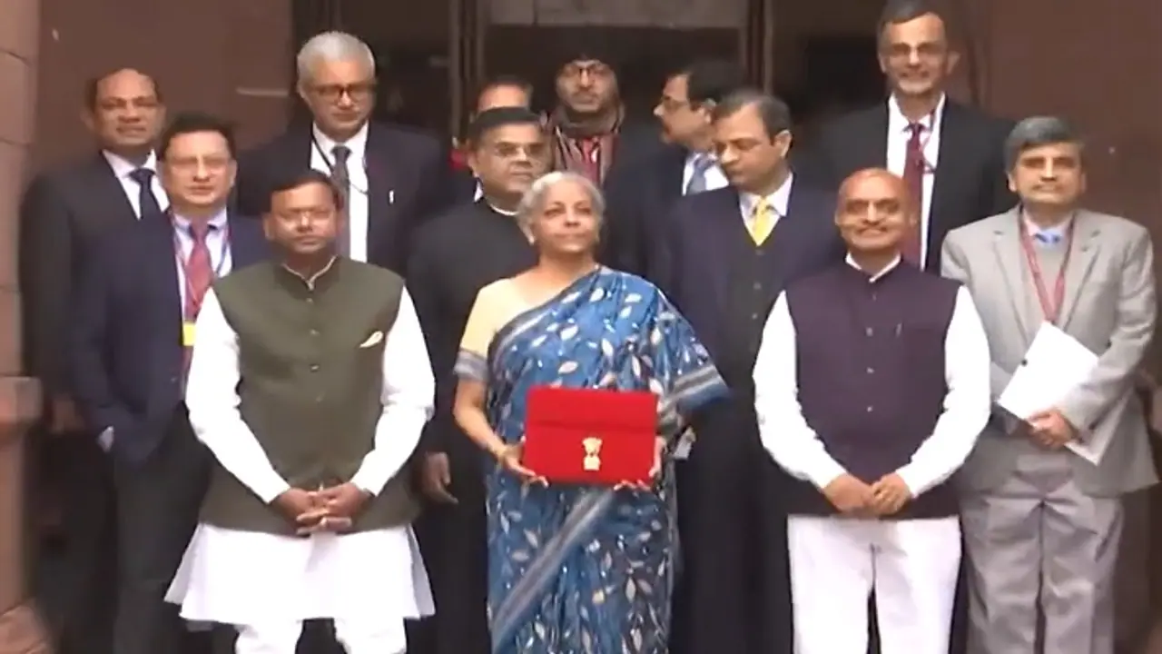 Interim Budget 2024: FM Nirmala Sitharaman dons blue saree, poses with red tablet