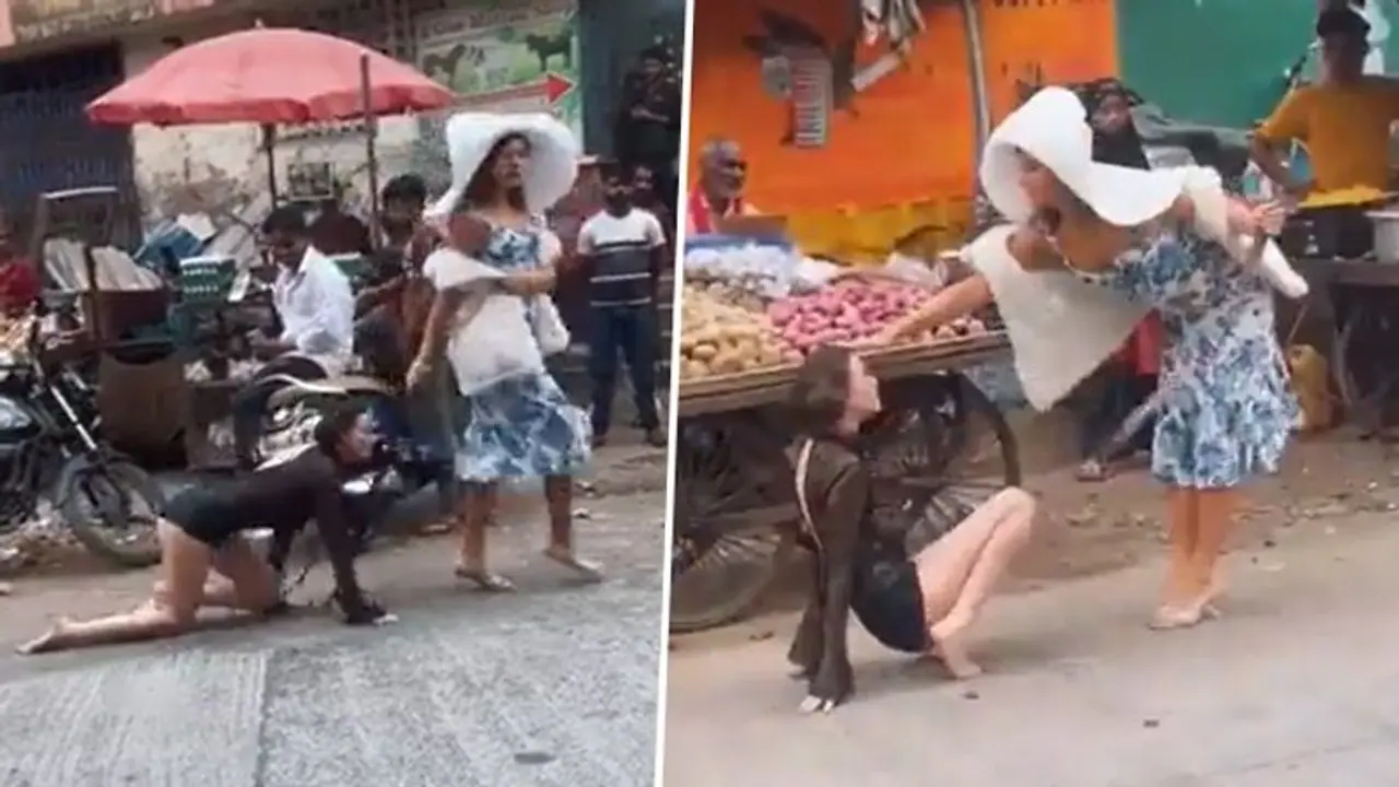 SHOCKING! Viral video captures woman walking another on leash in Mumbai, ignites netizens' curiosity (WATCH) SHOCKING! Viral video captures woman walking another on leash in Mumbai, ignites netizens' curiosity (WATCH)