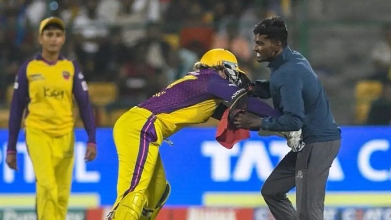 WPL 2024: UP Warriorz Alyssa Healy tackles pitch invader during clash against MI; WATCH viral video WPL 2024: UP Warriorz Alyssa Healy tackles pitch invader during clash against MI; WATCH viral video