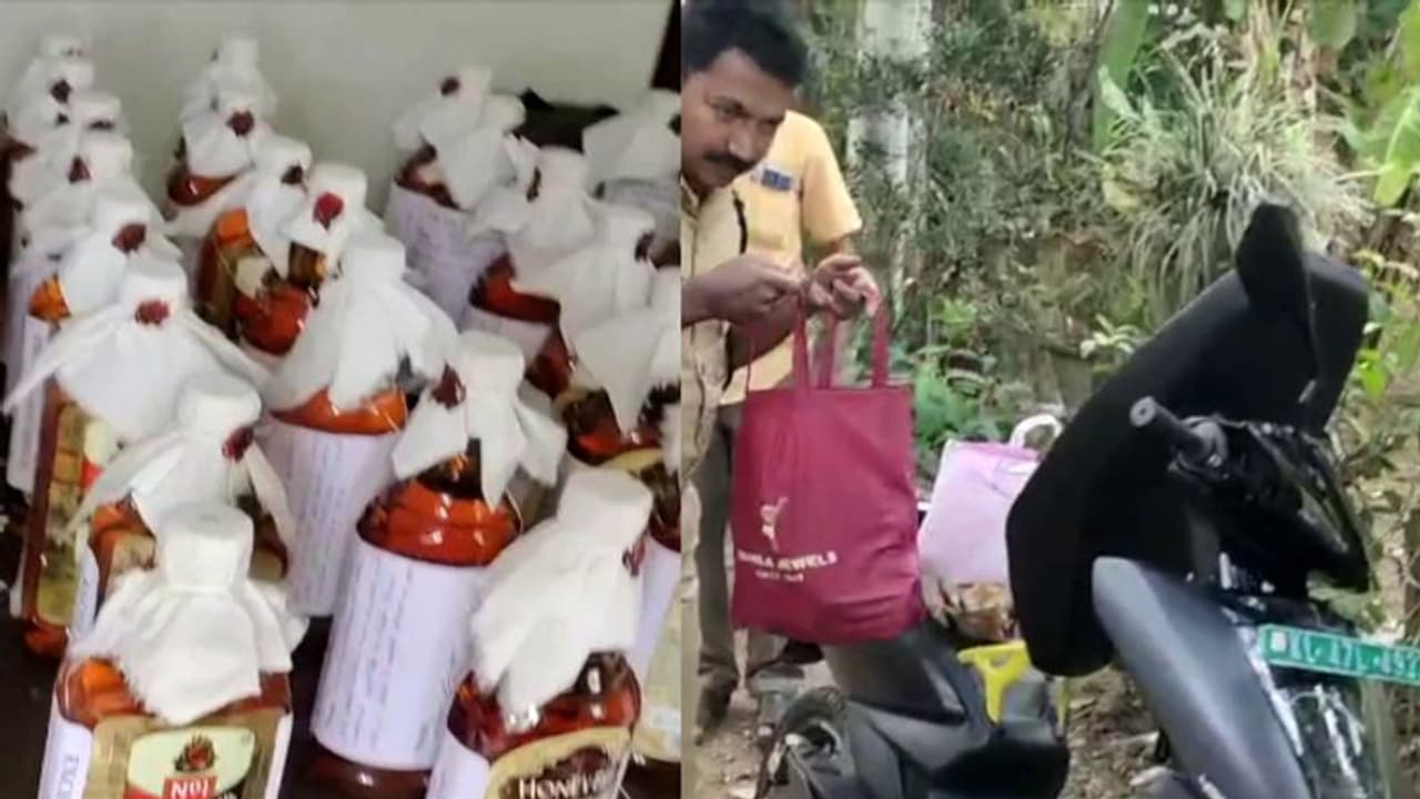 ഇലക്ട്രിക് സ്കൂട്ടറിൽ മദ്യവിൽപ്പന, പിടികൂടാനെത്തിയ എക്സൈസുകാർക്കുനേരെ വളര്ത്തു നായയെ അഴിച്ചുവിട്ട് ആക്രമണം ഇലക്ട്രിക് സ്കൂട്ടറിൽ മദ്യവിൽപ്പന, പിടികൂടാനെത്തിയ എക്സൈസുകാർക്കുനേരെ വളര്ത്തു നായയെ അഴിച്ചുവിട്ട് ആക്രമണം