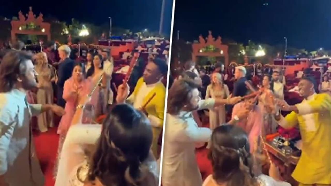 Dhoni plays dandiya with Bravo at Anant Ambani Radhika Merchant's pre wedding bash; WATCH viral video Dhoni plays dandiya with Bravo at Anant Ambani Radhika Merchant's pre wedding bash; WATCH viral video