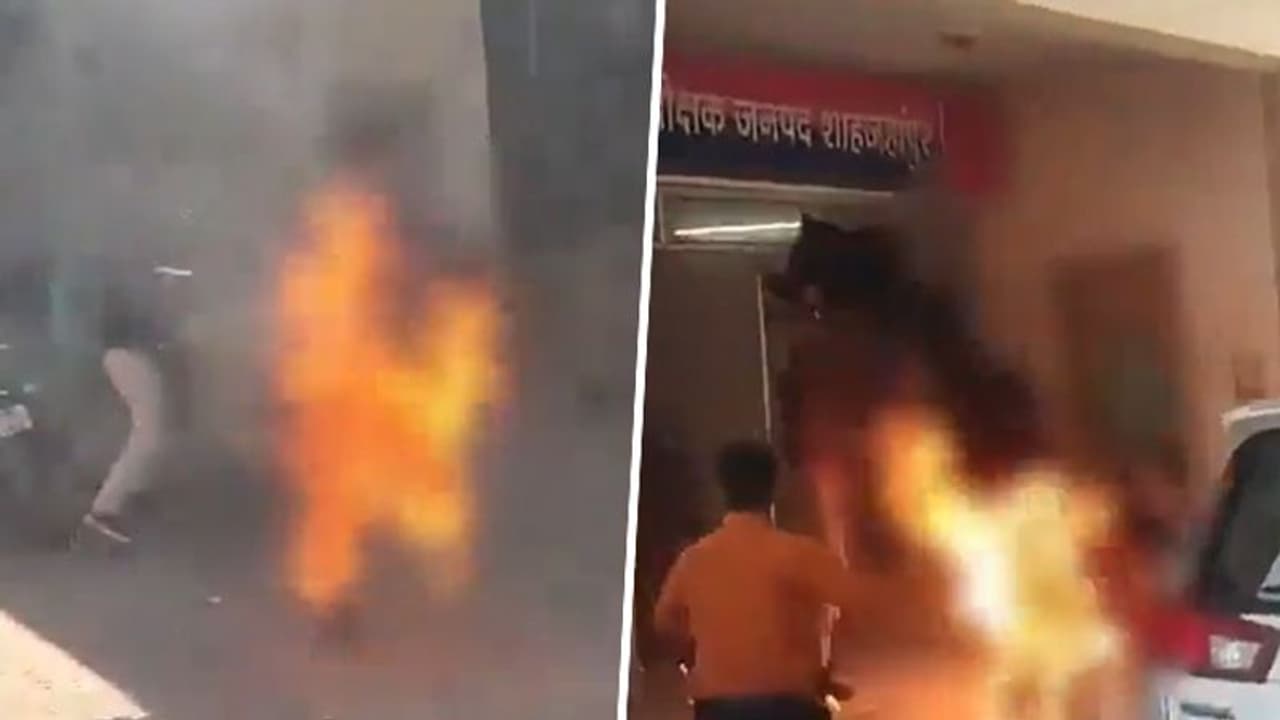 SHOCKING! Man sets himself ablaze outside police station in UP, saved by cops; WATCH viral video SHOCKING! Man sets himself ablaze outside police station in UP, saved by cops; WATCH viral video