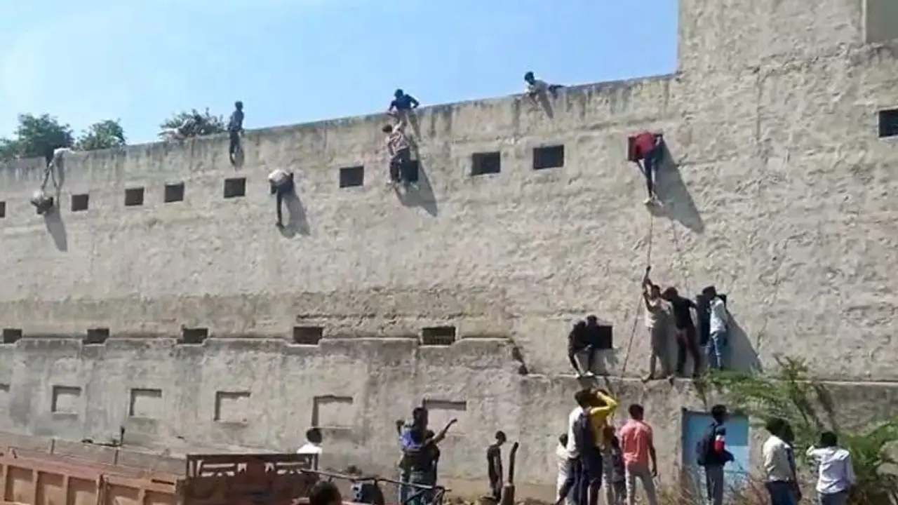 Shocking video emerges of large scale cheating in Haryana Class 10 board exam (WATCH) Shocking video emerges of large scale cheating in Haryana Class 10 board exam (WATCH)