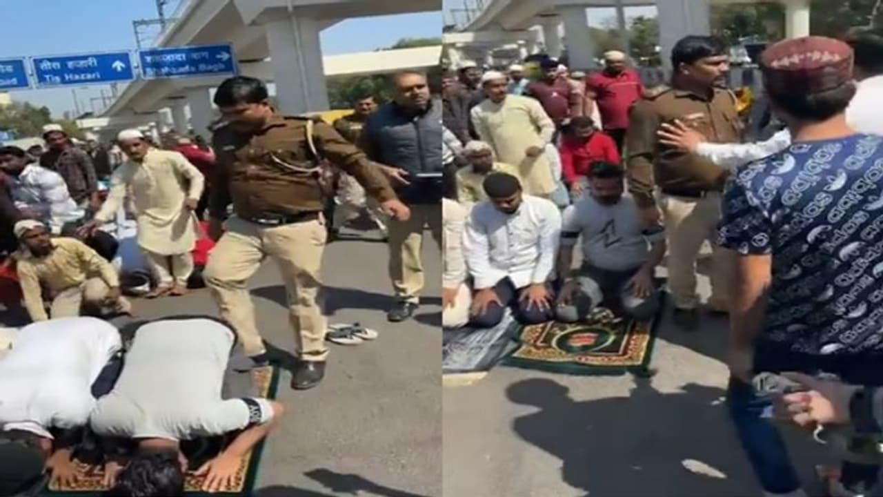 Viral Video! Delhi Police Cop was seen hitting and kicking people offering Namaz at road [WATCH]