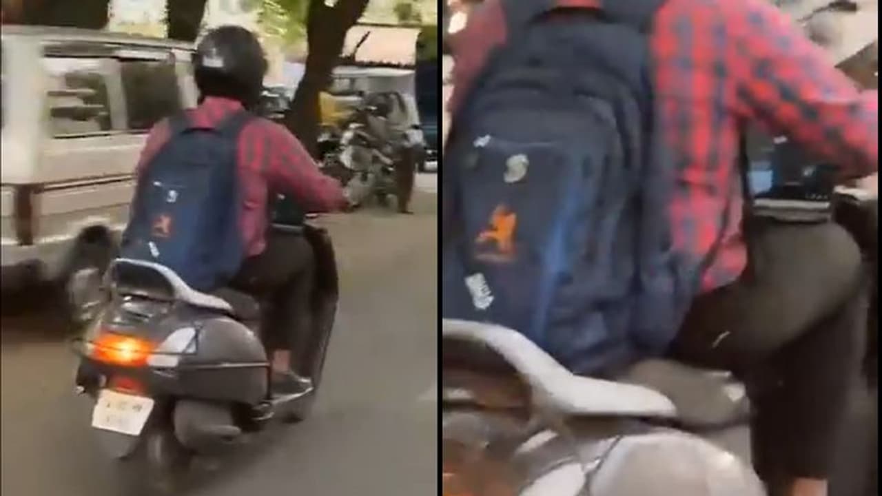 ಸ್ಕೂಟರ್‌ನಲ್ಲಿ ತೆರಳುತ್ತಾ ಲ್ಯಾಪ್‌ಟಾಪ್ ಮೂಲಕ ವಿಡಿಯೋ ಮೀಟಿಂಗ್,ಬೆಂಗಳೂರಿನ ಬ್ಯೂಸಿ ಲೈಫ್ Video!