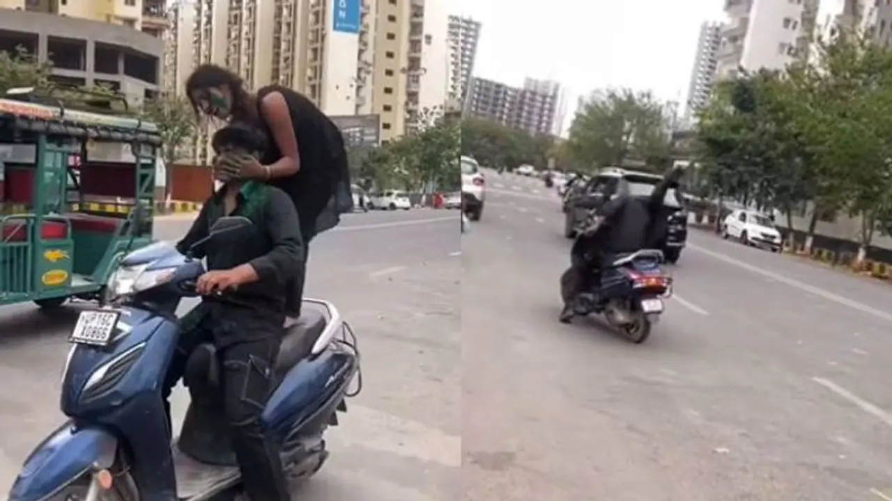 എന്തൊക്കെ കാണണം? സ്കൂട്ടറിൽ പെൺകുട്ടിയുടെ സാഹസപ്രകടനം, മൂക്കും കുത്തി താഴെ, പിഴ ചുമത്തി പൊലീസ്