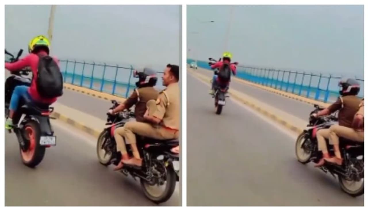  ഒ... എന്നാലും എന്നാ പോക്കാ സാറേ അത്.....; പോലീസുകാർ കാണ്‍കെ യുവാവിന്‍റെ ബൈക്ക് സ്റ്റണ്ട്, വീഡിയോ വൈറല്‍