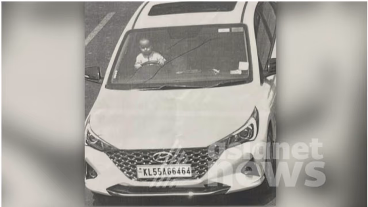 3 വയസുകാരനെ മടിയിൽ ഇരുത്തി ഡ്രൈവിംഗ്; എഐ ക്യാമറയിൽ കുടുങ്ങി, ലൈസൻസ് സസ്പെൻഡ് ചെയ്ത് മോട്ടോർ വാഹന വകുപ്പ് 3 വയസുകാരനെ മടിയിൽ ഇരുത്തി ഡ്രൈവിംഗ്; എഐ ക്യാമറയിൽ കുടുങ്ങി, ലൈസൻസ് സസ്പെൻഡ് ചെയ്ത് മോട്ടോർ വാഹന വകുപ്പ്