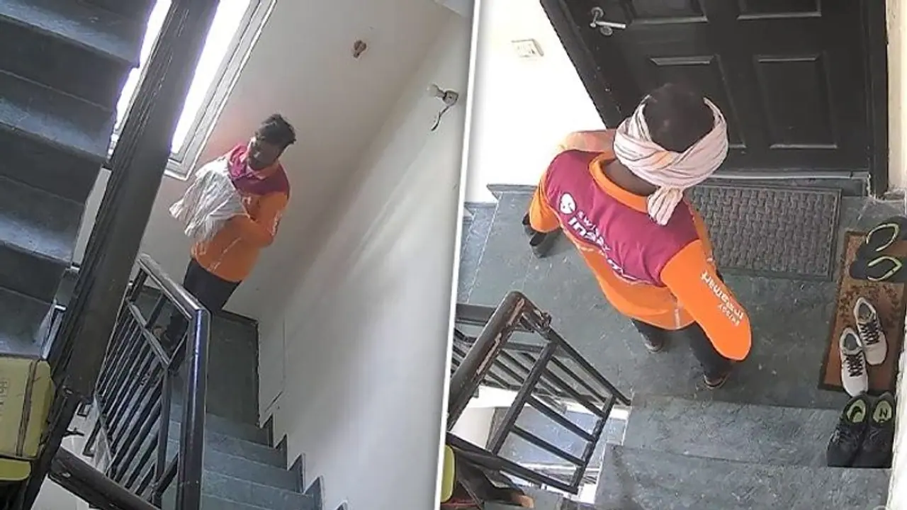 Viral video: Swiggy's delivery boy steals pair of shoes kept outside Gurugram flat, company reacts (WATCH) Viral video: Swiggy's delivery boy steals pair of shoes kept outside Gurugram flat, company reacts (WATCH)