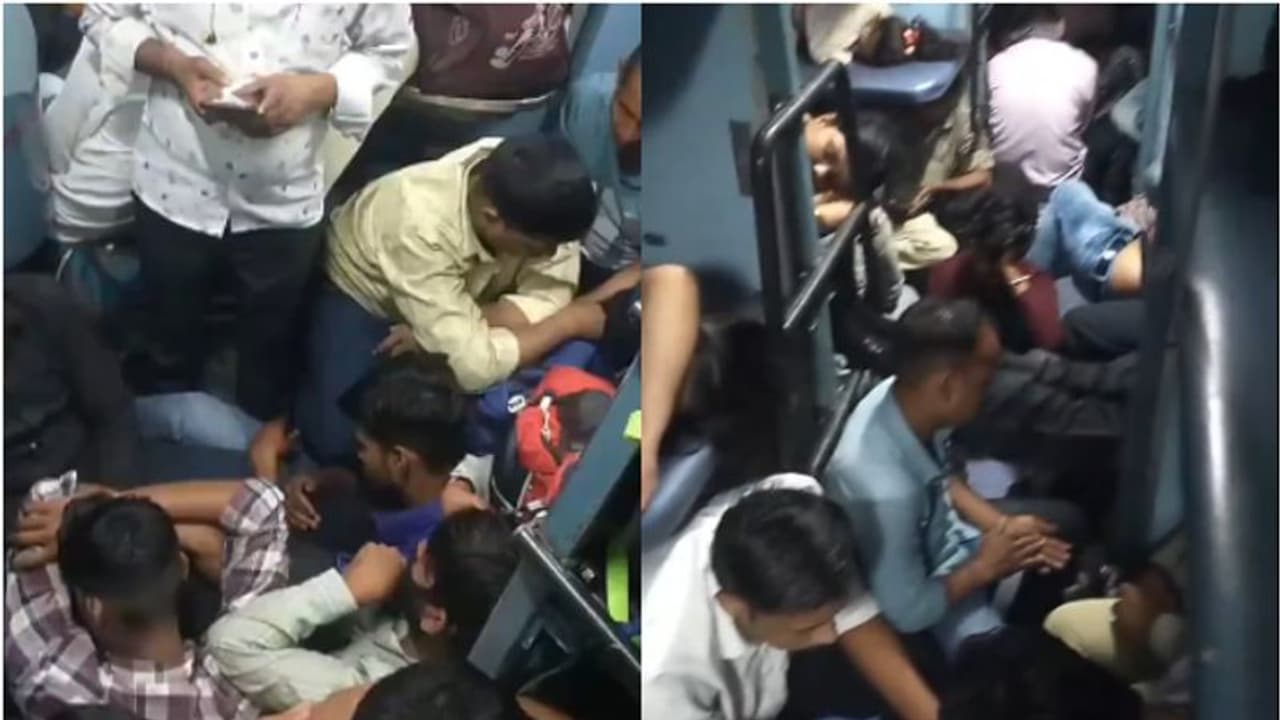 സ്ലീപ്പർ കോച്ചാ, എന്തുകാര്യം? നിലത്ത് തിങ്ങിനിറഞ്ഞ് ടിക്കറ്റില്ലാത്ത യാത്രക്കാർ; വീഡിയോ, പ്രതികരിച്ച് റെയിൽവേ സ്ലീപ്പർ കോച്ചാ, എന്തുകാര്യം? നിലത്ത് തിങ്ങിനിറഞ്ഞ് ടിക്കറ്റില്ലാത്ത യാത്രക്കാർ; വീഡിയോ, പ്രതികരിച്ച് റെയിൽവേ