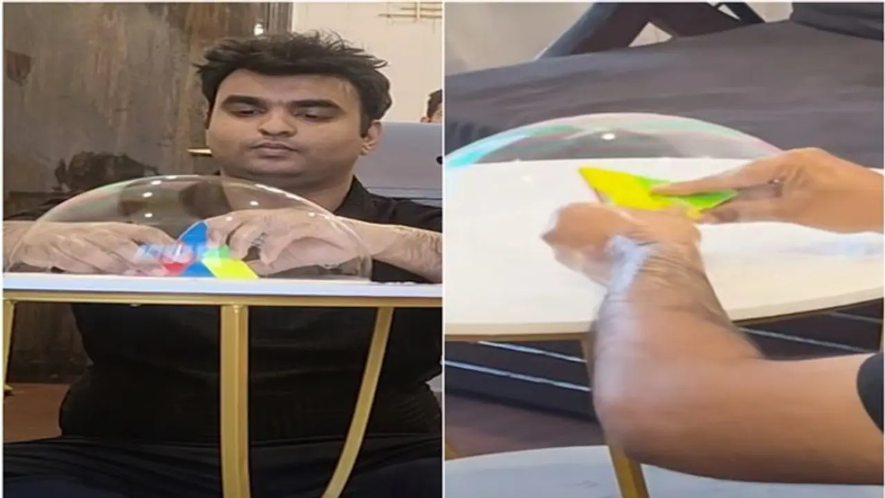 Mumbai based cyber security expert sets Guinness Record for completing puzzle revolving inside a soap bubble