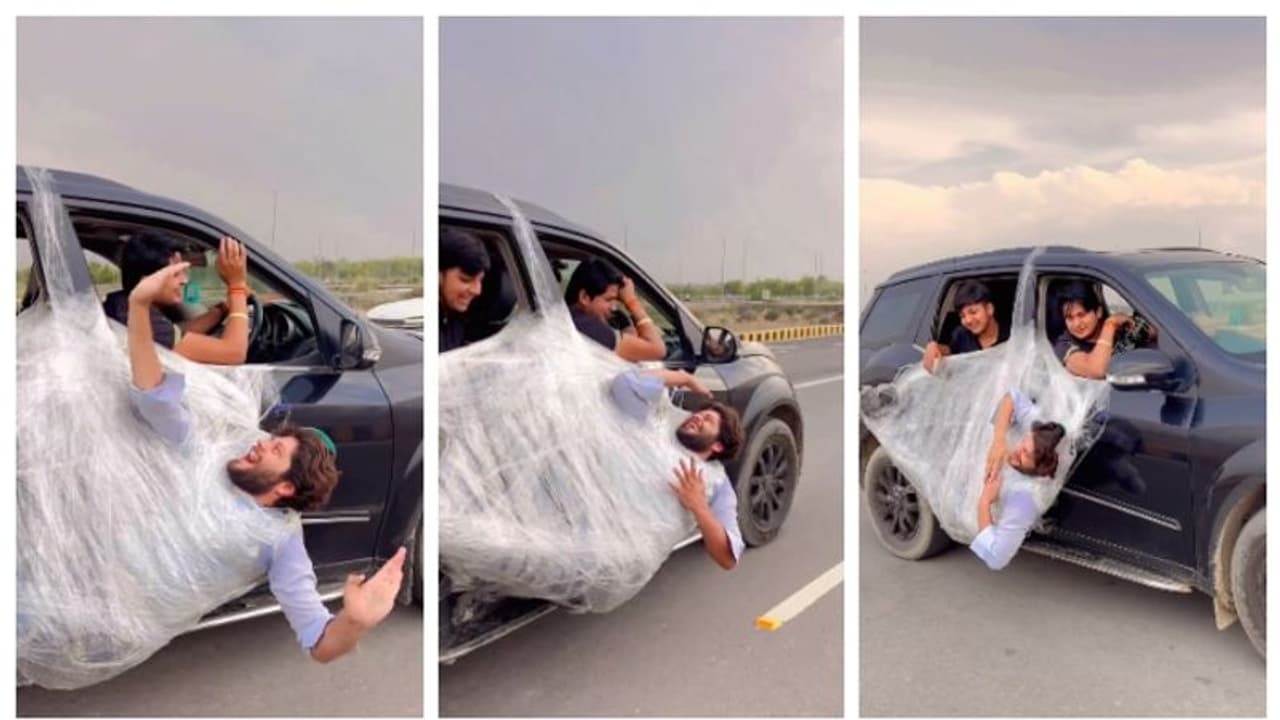 ഓടുന്ന കാറിന്‍റെ ഡോറില്‍ പൊതിഞ്ഞ് വച്ച നിലയില്‍ ഒരാള്‍; വൈറലായി ഒരു സ്റ്റണ്ട് വീഡിയോ 