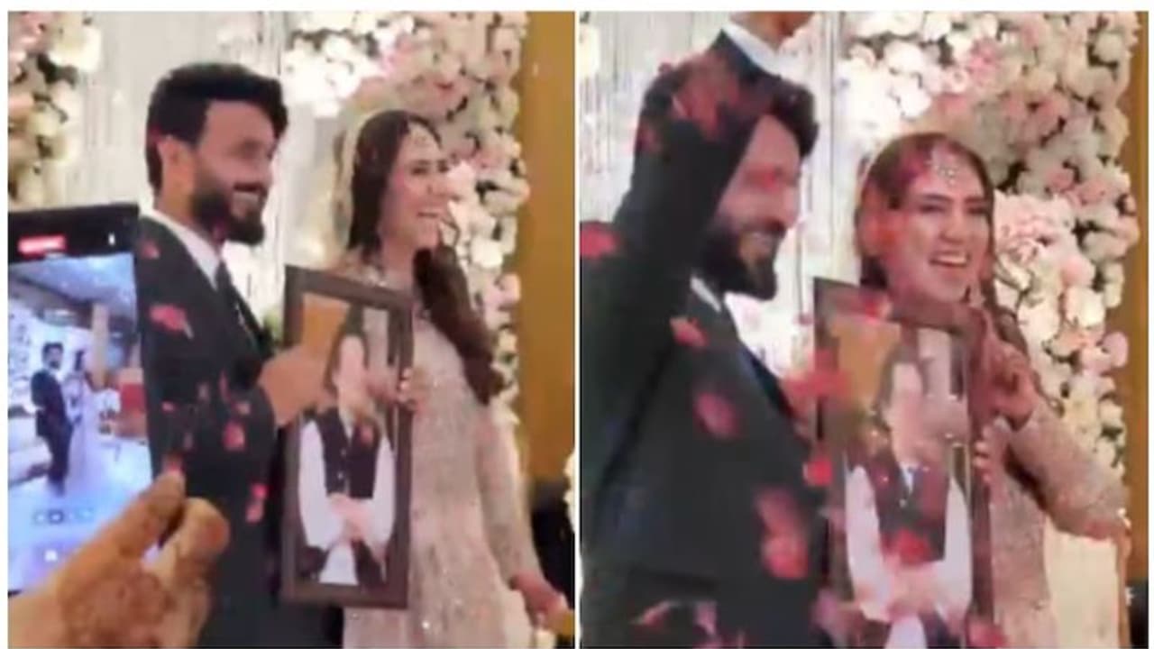 നീല കവറില്‍ പൊതിഞ്ഞ് വധുവിനായി സർപ്രൈസ് സമ്മാനവുമായി വരൻ; വേദിയില്‍ തന്നെ തുറന്ന് നോക്കി, വൈറലായി വീഡിയോ