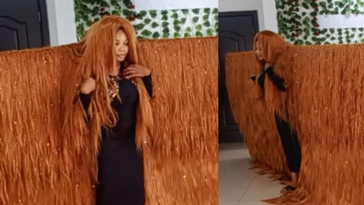 Breaking Records: Nigerian Woman Sets New World Record for the Widest Wig [WATCH]