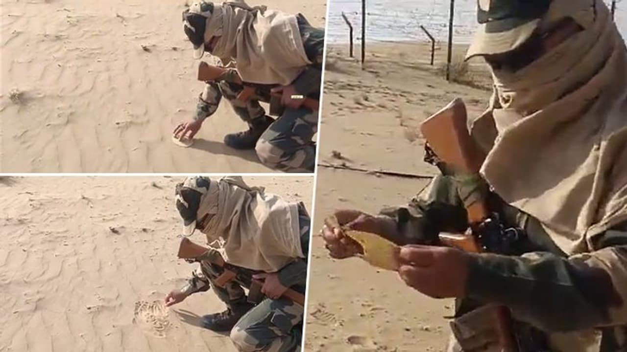 Rajasthan: BSF jawan roasts papad on hot sand in Bikaner amid soaring temperatures; video goes viral (WATCH) Rajasthan: BSF jawan roasts papad on hot sand in Bikaner amid soaring temperatures; video goes viral (WATCH)