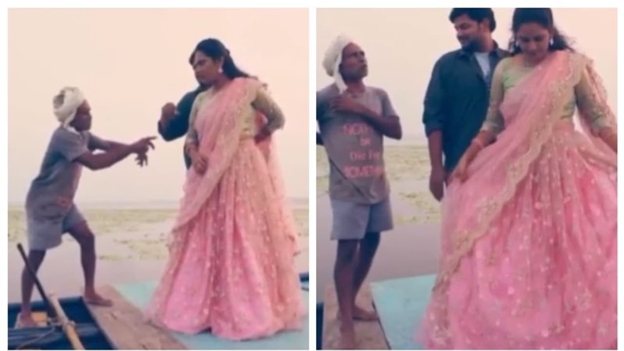 'ടൈറ്റാനിക്ക് സംവിധാനം ചെയ്യും'; പ്രീവെഡ്ഡിംഗ് ഷൂട്ടിൽ തോണിക്കാരന്റെ ഇടപെടലിന് കൈയടിച്ച് സോഷ്യൽ മീഡിയ 'ടൈറ്റാനിക്ക് സംവിധാനം ചെയ്യും'; പ്രീവെഡ്ഡിംഗ് ഷൂട്ടിൽ തോണിക്കാരന്റെ ഇടപെടലിന് കൈയടിച്ച് സോഷ്യൽ മീഡിയ