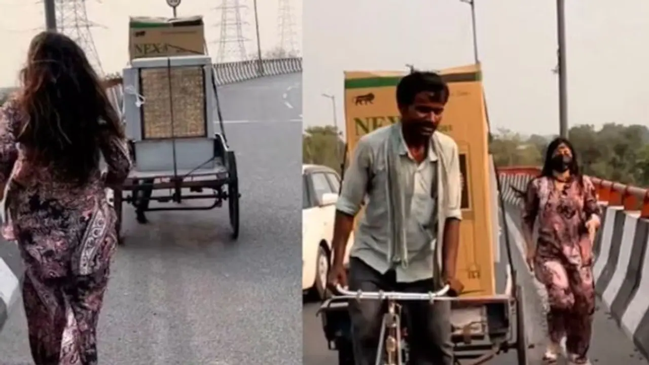 ಗೂಡ್ಸ್ ಸಾಗಿಸುತ್ತಿದ್ದ ವ್ಯಕ್ತಿಗೆ ನೆರವಾದ ಯುವತಿ, ನೆಟ್ಟಿಗರಿಂದ ಮೆಚ್ಚುಗೆ ಗೂಡ್ಸ್ ಸಾಗಿಸುತ್ತಿದ್ದ ವ್ಯಕ್ತಿಗೆ ನೆರವಾದ ಯುವತಿ, ನೆಟ್ಟಿಗರಿಂದ ಮೆಚ್ಚುಗೆ