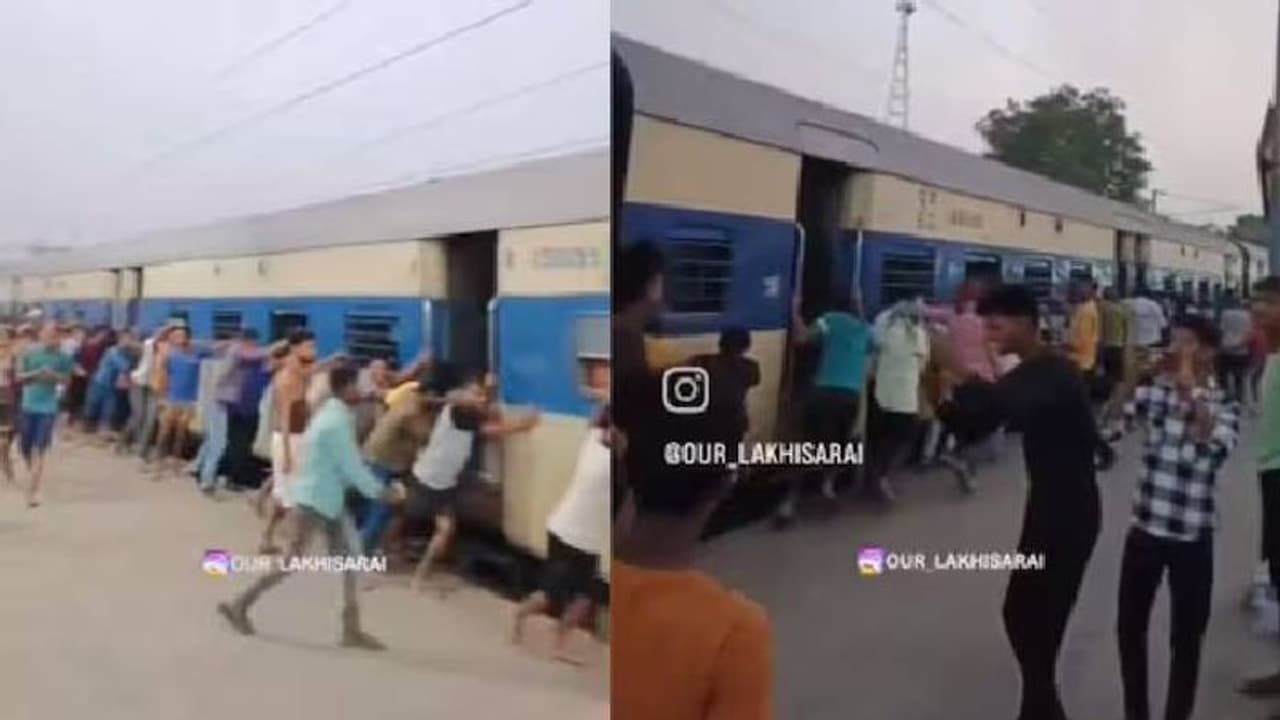 തള്ളോട് തള്ള്, യാത്രക്കാരെല്ലാം ചേർന്ന് ആഞ്ഞുതള്ളുന്നത് ട്രെയിൻ, വൈറലായി വീഡിയോ തള്ളോട് തള്ള്, യാത്രക്കാരെല്ലാം ചേർന്ന് ആഞ്ഞുതള്ളുന്നത് ട്രെയിൻ, വൈറലായി വീഡിയോ