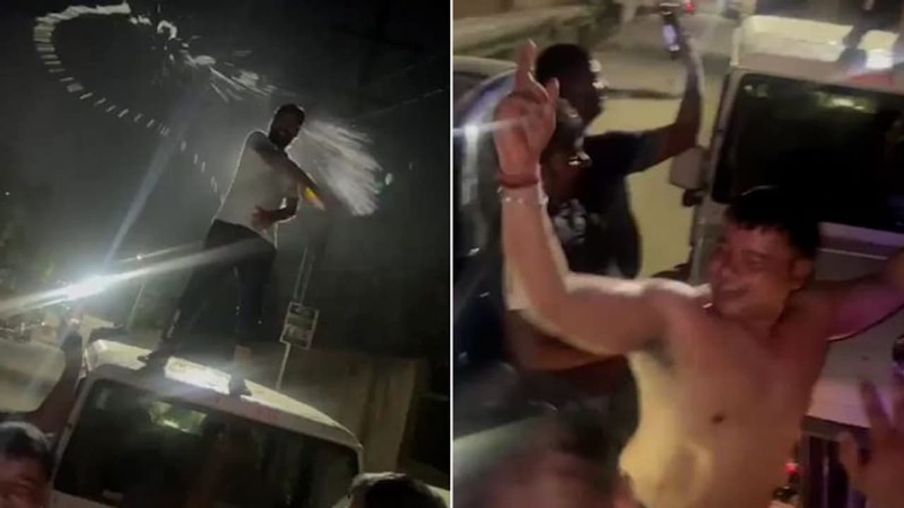 Viral video shows shirtless man dancing on government vehicle in Noida; police take action (WATCH)