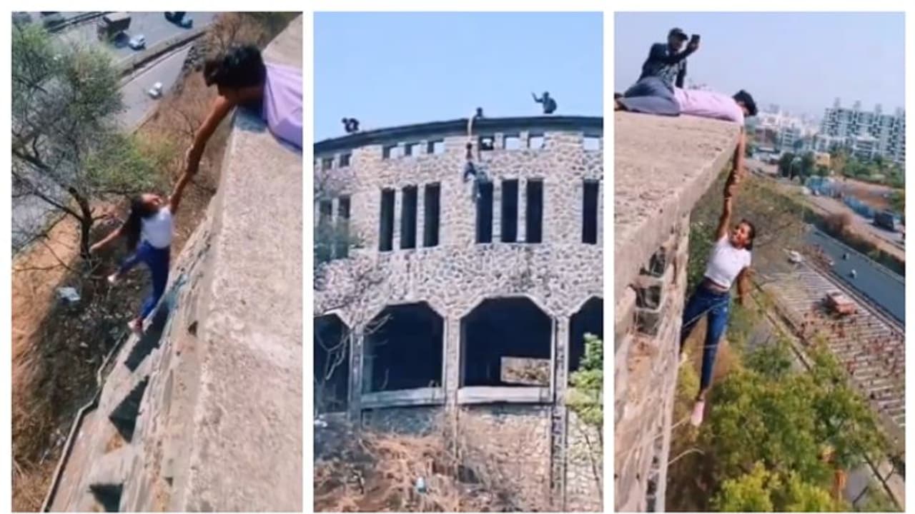 'എല്ലാം റീൽസിന് വേണ്ടി'; കെട്ടിടത്തിന്റെ മുകളിൽ നിന്നും ഒറ്റക്കൈയിൽ തൂങ്ങിക്കിടക്കുന്ന പെണ്കുട്ടിയുടെ വീഡിയോ 'എല്ലാം റീൽസിന് വേണ്ടി'; കെട്ടിടത്തിന്റെ മുകളിൽ നിന്നും ഒറ്റക്കൈയിൽ തൂങ്ങിക്കിടക്കുന്ന പെണ്കുട്ടിയുടെ വീഡിയോ