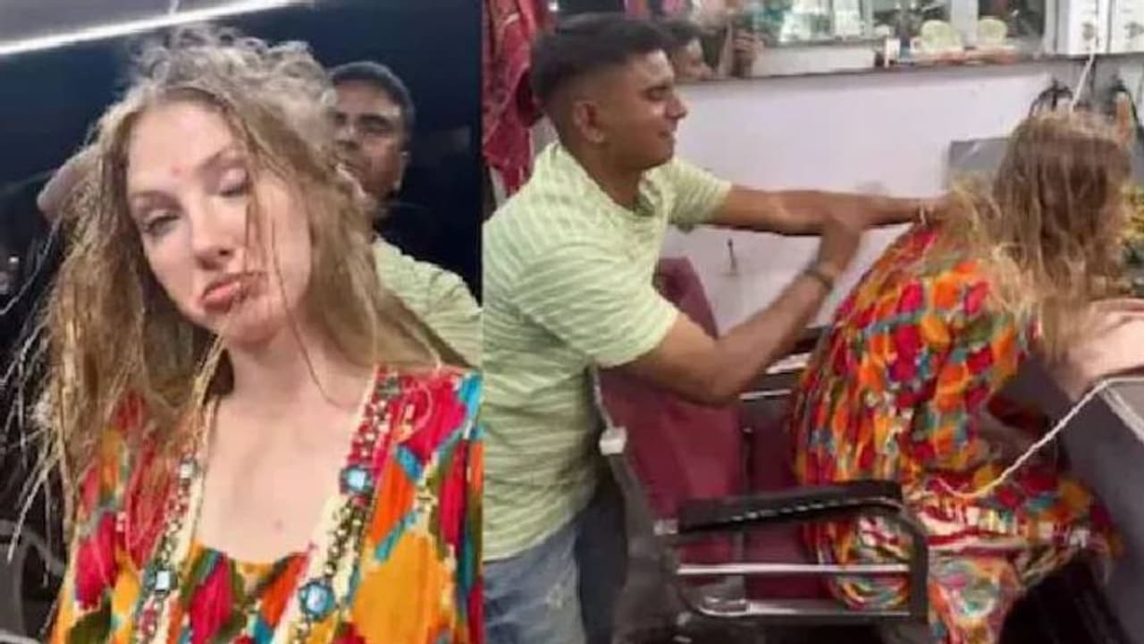 മുംബൈയിലെ ബാർബർ ഷോപ്പിൽ റഷ്യൻ യുവതിക്ക് തല മസ്സാജിം​ഗ്, വൈറലായി വീഡിയോ