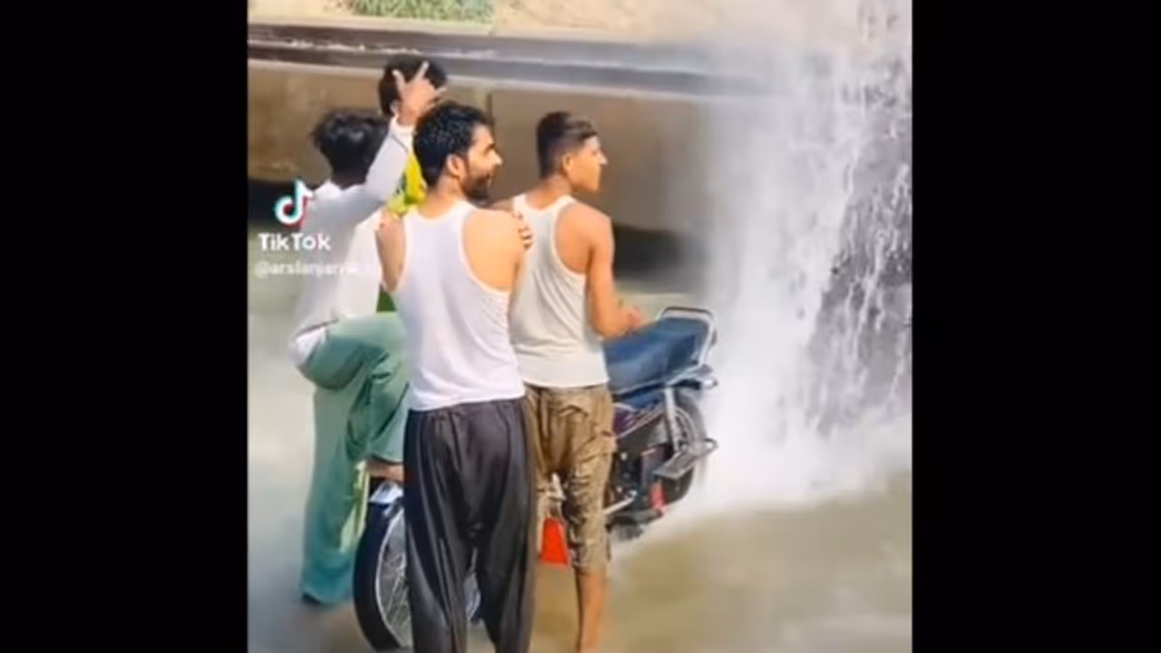 Pranksters Spraying Water on Moving Train Face Passenger Fury; Police Seize Bike [WATCH]