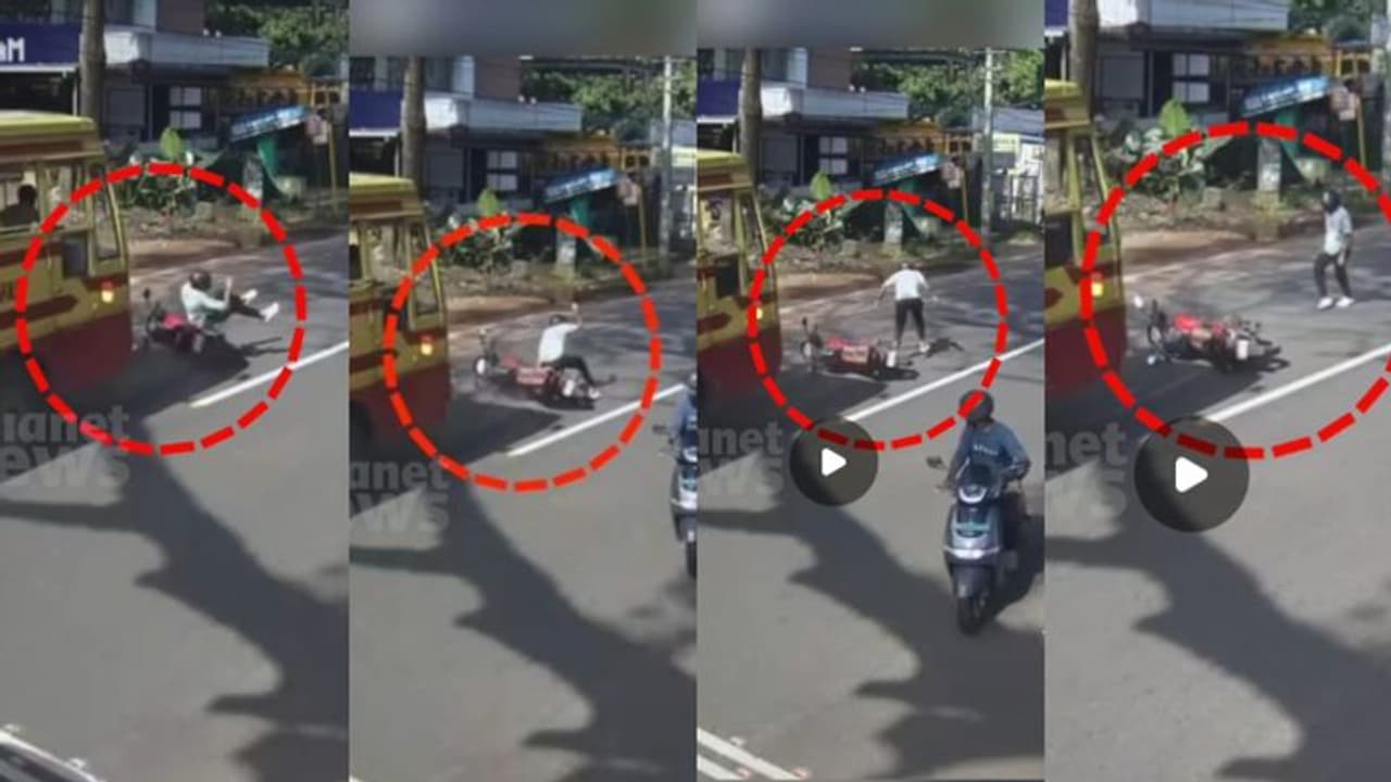 ബൈക്കിന് പിന്നിൽ പാഞ്ഞു വന്നിടിച്ച് കെഎസ്ആർടിസി, റോഡിലേക്ക് തെറിച്ച് വീണ് യുവാവ്; അത്ഭുതകരമായി രക്ഷപ്പെടൽ ബൈക്കിന് പിന്നിൽ പാഞ്ഞു വന്നിടിച്ച് കെഎസ്ആർടിസി, റോഡിലേക്ക് തെറിച്ച് വീണ് യുവാവ്; അത്ഭുതകരമായി രക്ഷപ്പെടൽ