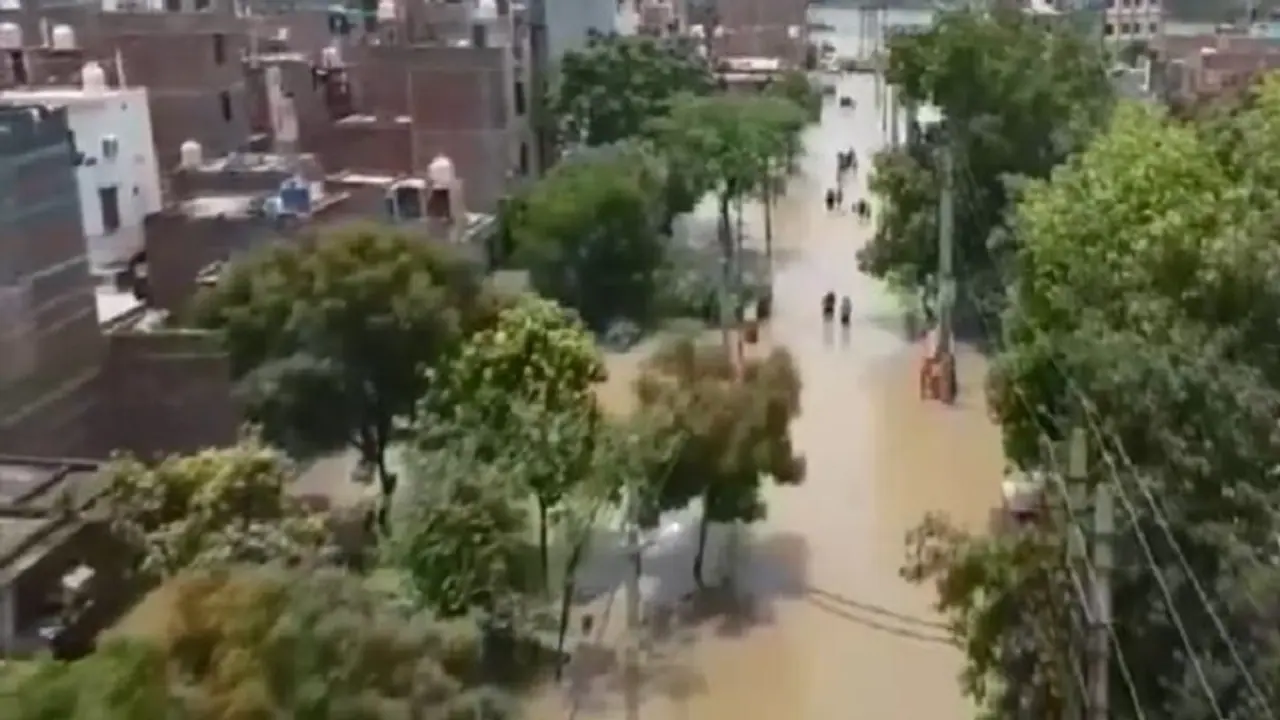 Munak canal break in Delhi: Drone footage shows Bawana residents in waist deep flood, AAP targeted (WATCH) Munak canal break in Delhi: Drone footage shows Bawana residents in waist deep flood, AAP targeted (WATCH)