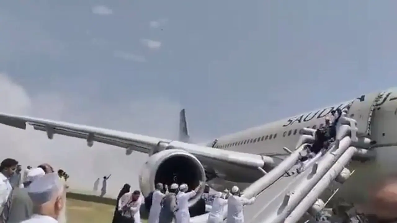 Saudi Airlines with 297 aboard catches fire at Peshawar airport; evacuation videos go viral (WATCH) Saudi Airlines with 297 aboard catches fire at Peshawar airport; evacuation videos go viral (WATCH)