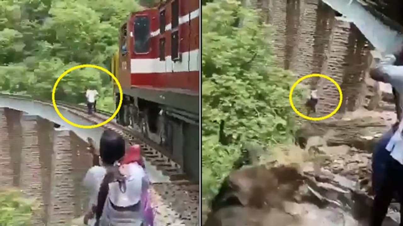 ಫೋಟೋಶೂಟ್ ವೇಳೆ ರೈಲಿನಿಂದ ಪ್ರಾಣಉಳಿಸಲು 90 ಅಡಿ ಎತ್ತರದ ಹಳಿಯಿಂದ ಹಾರಿದ ಜೋಡಿ! ಫೋಟೋಶೂಟ್ ವೇಳೆ ರೈಲಿನಿಂದ ಪ್ರಾಣಉಳಿಸಲು 90 ಅಡಿ ಎತ್ತರದ ಹಳಿಯಿಂದ ಹಾರಿದ ಜೋಡಿ!