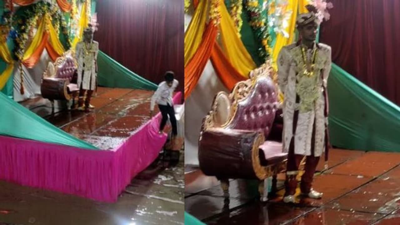 കൊടുംമഴ, മുഖഭാവം പോലും മാറാതെ മഴയത്ത് നിൽക്കുന്ന വരൻ, വൈറലായി വീഡിയോ കൊടുംമഴ, മുഖഭാവം പോലും മാറാതെ മഴയത്ത് നിൽക്കുന്ന വരൻ, വൈറലായി വീഡിയോ