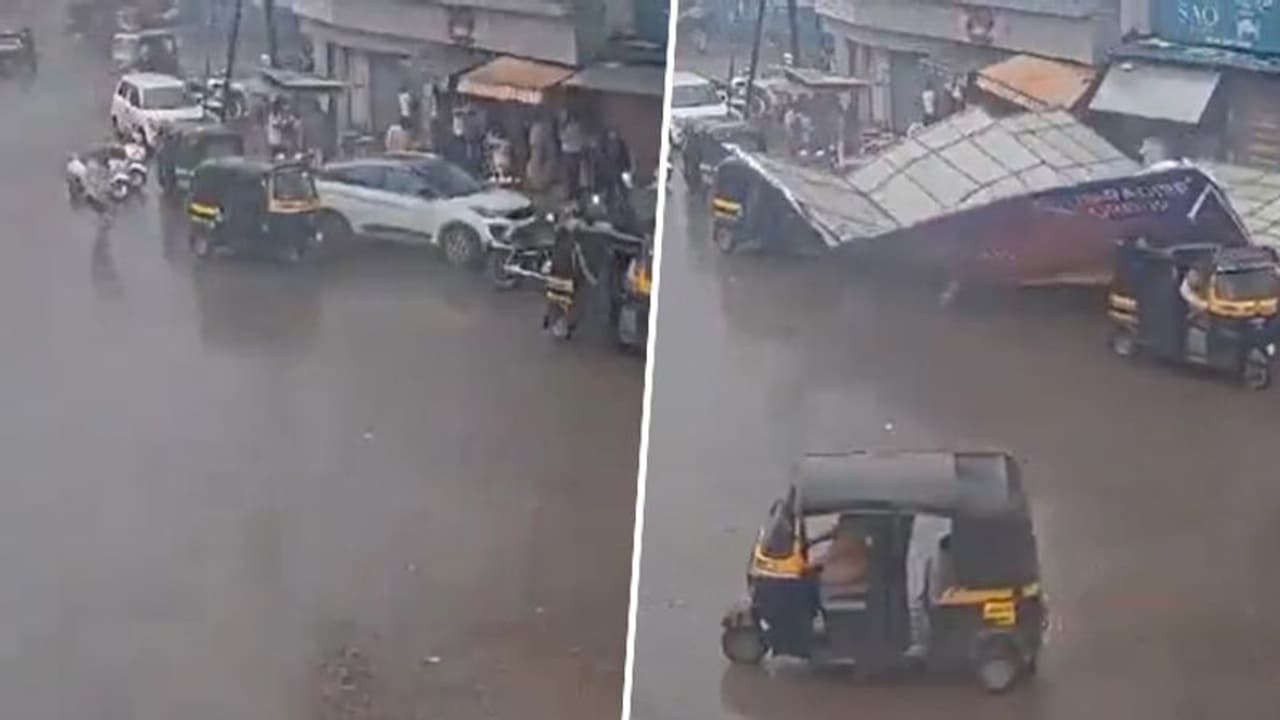 Maharashtra: Billboard collapses onto vehicles in Thane's Kalyan amid heavy rain; Video goes viral (WATCH) Maharashtra: Billboard collapses onto vehicles in Thane's Kalyan amid heavy rain; Video goes viral (WATCH)