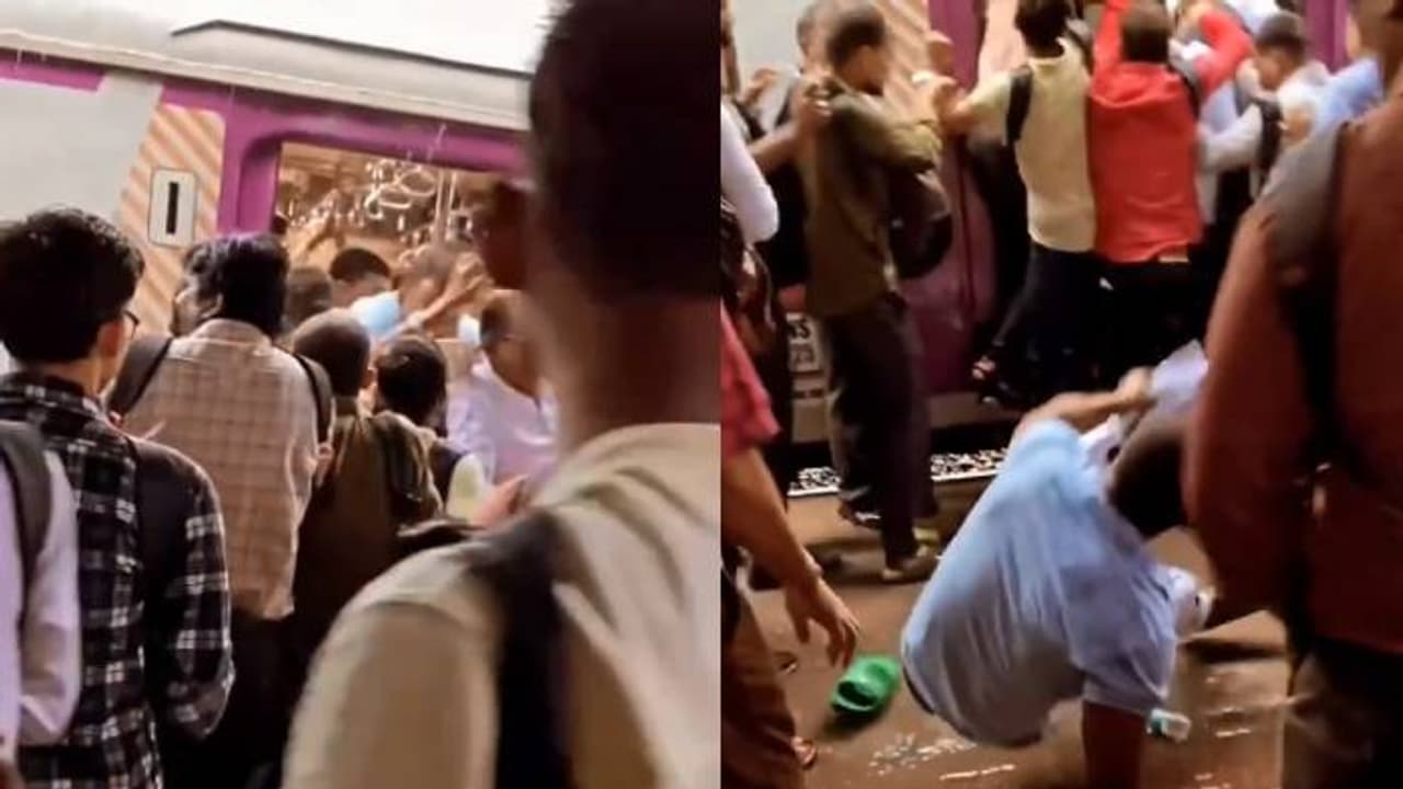 ദുരിതയാത്ര; വണ്ടി നിർത്തിയതേയുള്ളൂ, ഇരച്ചെത്തി യാത്രികർ, പ്ലാറ്റ്ഫോമിൽ വീണ് യുവാവ്, വീഡിയോ ദുരിതയാത്ര; വണ്ടി നിർത്തിയതേയുള്ളൂ, ഇരച്ചെത്തി യാത്രികർ, പ്ലാറ്റ്ഫോമിൽ വീണ് യുവാവ്, വീഡിയോ