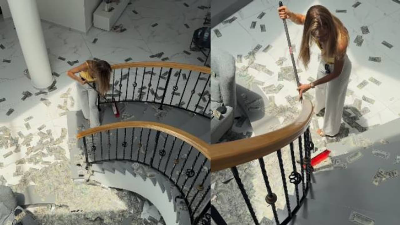 കാശിനോടല്‍പം ബഹുമാനമൊക്കെ വേണ്ടേ? നോട്ടുകൾ അടിച്ചുവാരിക്കൂട്ടുന്ന യുവതി, വീഡിയോ 