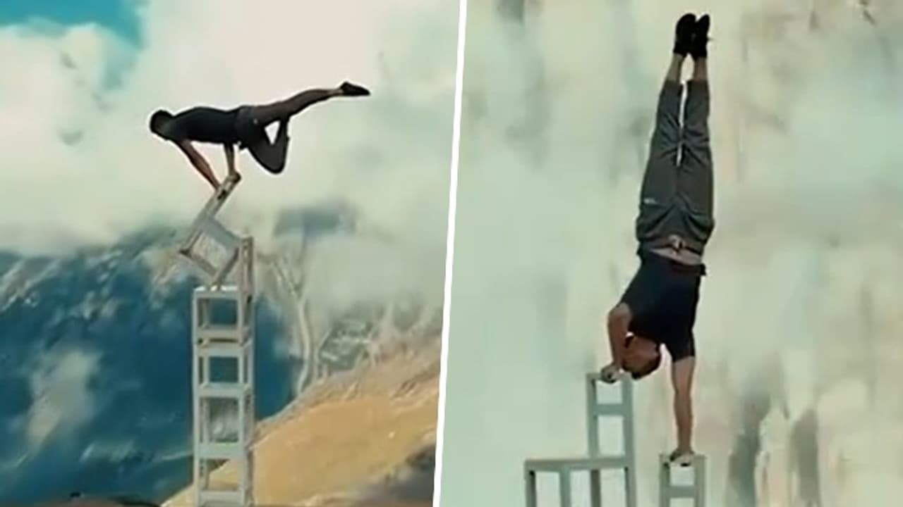 JAW DROPPING! Kazakh acrobat's balancing act with 3,200 metre chair stack stunt stuns world (WATCH) JAW DROPPING! Kazakh acrobat's balancing act with 3,200 metre chair stack stunt stuns world (WATCH)