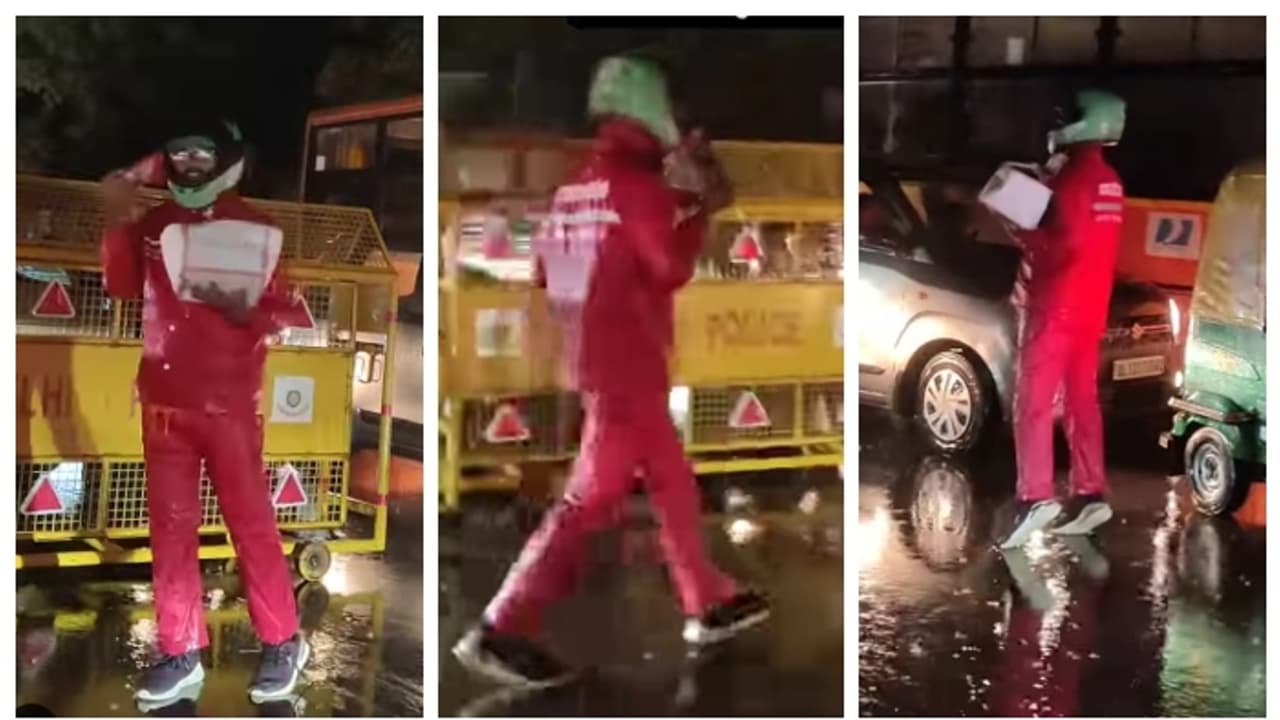 പെരുമഴ, രാത്രി, ഒരു കൈയിൽ ഓർഡർ, മറുകൈയിൽ ഫോൺ; ട്രാഫിക് ജാമിനിടെ ഓർഡർ ചെയ്തയാളെ തപ്പി ഡെലിവറി ഏജന്‍റ്; വീഡിയോ 