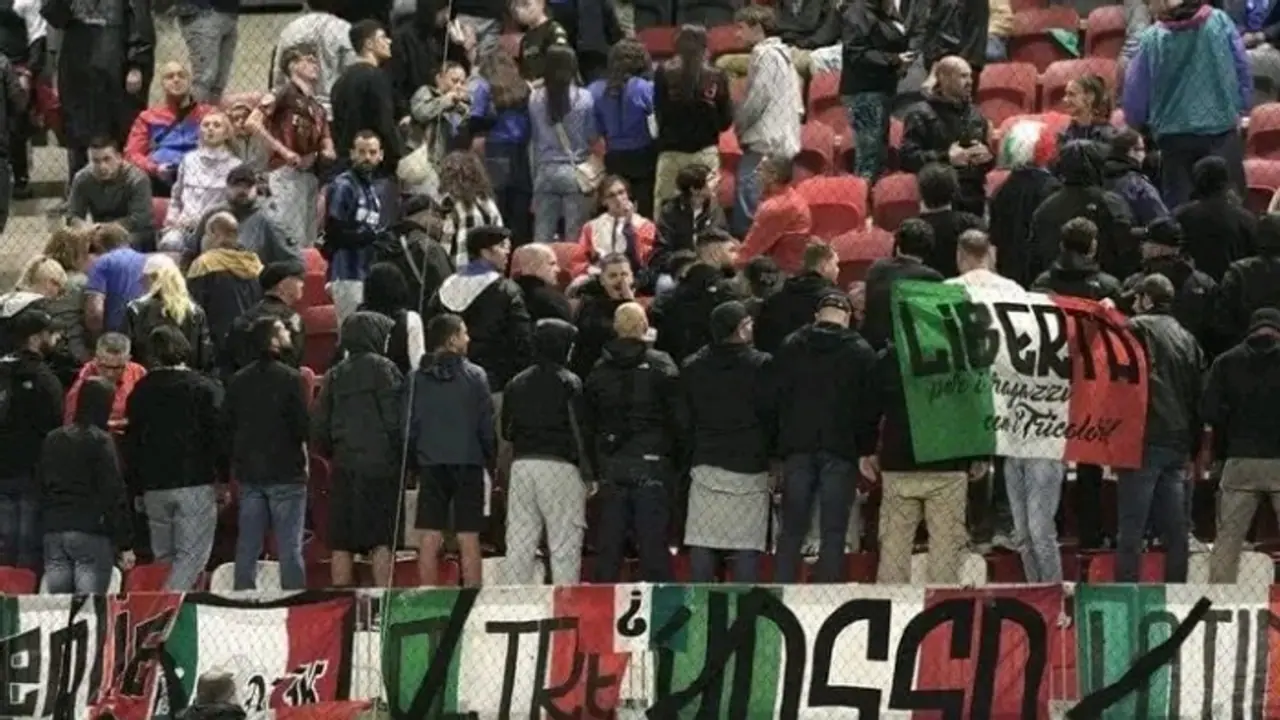 Italian football fans turn their backs during Israel's anthem before Nations League match Italian football fans turn their backs during Israel's anthem before Nations League match