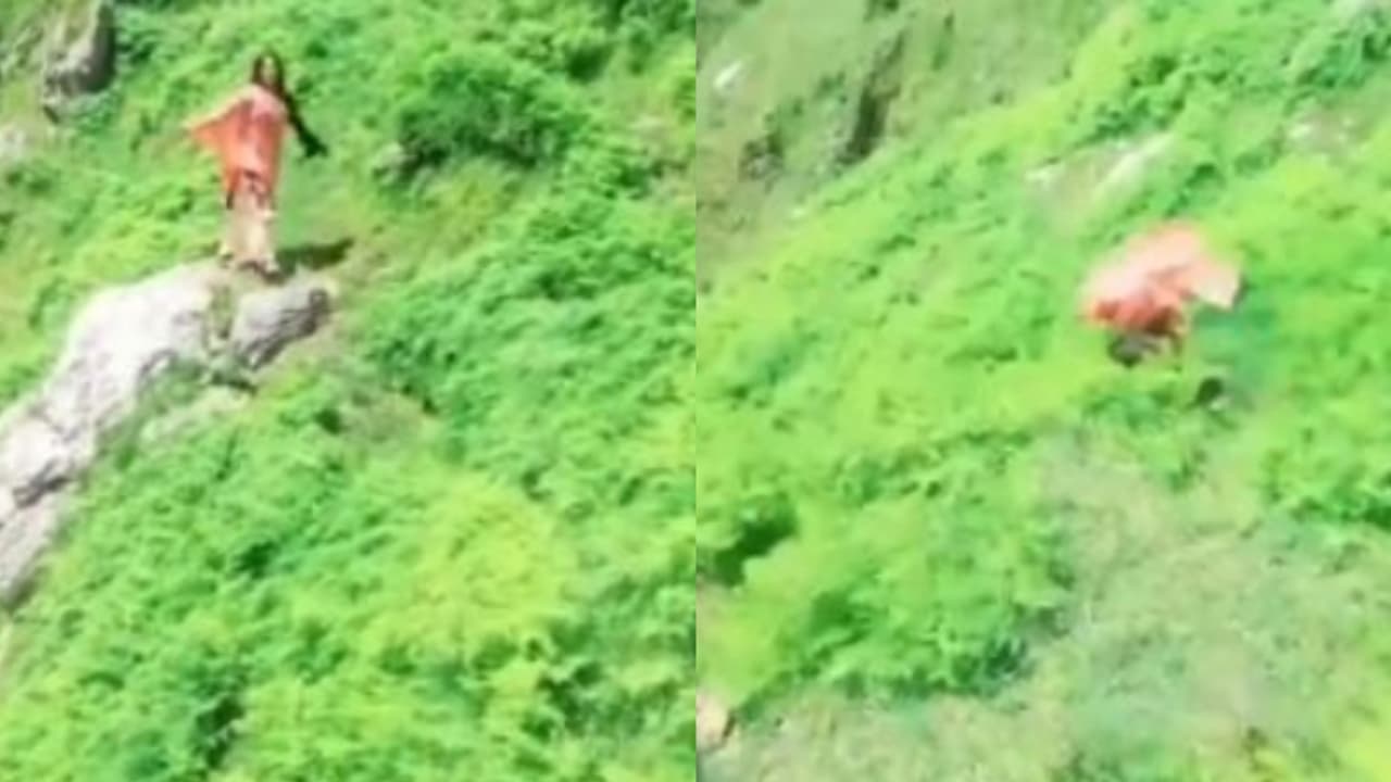 റീൽസ് ഷൂട്ടിനിടെ മലമുകളിൽ നിന്ന് കാൽ വഴുതി, കൊക്കയിലേക്ക് ഉരുണ്ട് വീണ് യുവതി വീഡിയോ റീൽസ് ഷൂട്ടിനിടെ മലമുകളിൽ നിന്ന് കാൽ വഴുതി, കൊക്കയിലേക്ക് ഉരുണ്ട് വീണ് യുവതി വീഡിയോ