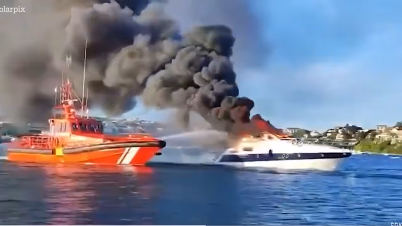 Dramatic rescue of 4 Britons as luxury yacht explodes in flames before sinking off Menorca island (WATCH)
