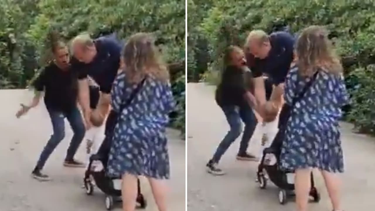 SHOCKING! Angry man yells at tourist couple, slaps their baby in Barcelona; viral video sparks outrage (WATCH) SHOCKING! Angry man yells at tourist couple, slaps their baby in Barcelona; viral video sparks outrage (WATCH)