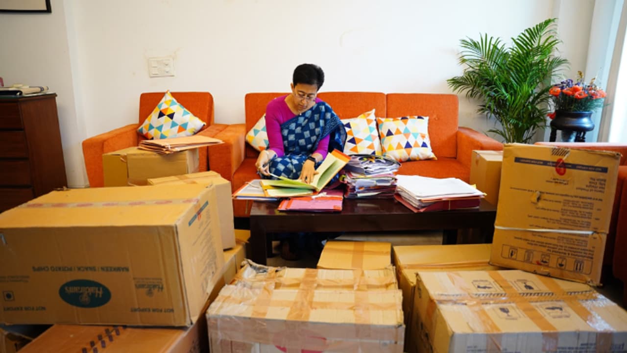 Delhi CM residence row: Atishi works amid packed cartons at her Kalkaji home; Check out viral photos Delhi CM residence row: Atishi works amid packed cartons at her Kalkaji home; Check out viral photos