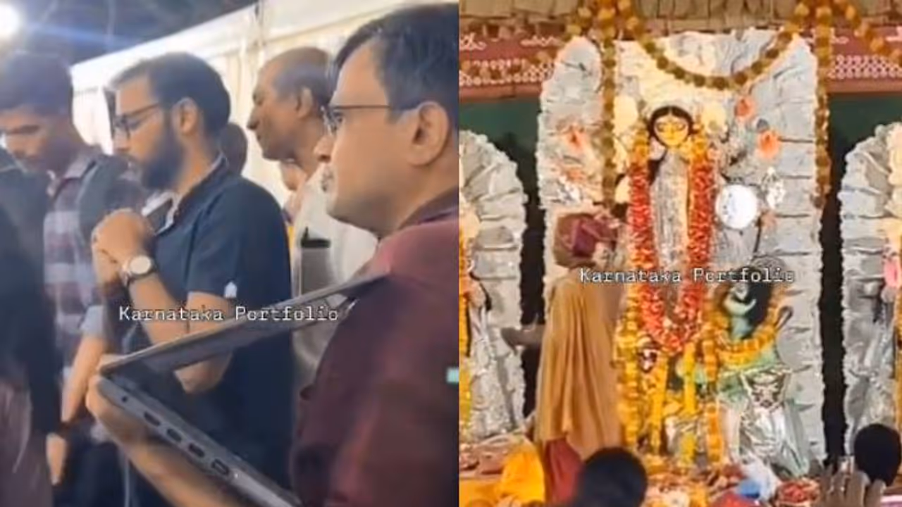 ഇങ്ങനെയുമുണ്ടോ ഒരു ജോലിത്തിരക്ക്? നവരാത്രി പന്തലിൽ ഒരു കയ്യിൽ ലാപ്ടോപ്പും മറുകയ്യിൽ ഫോണുമായി ഒരാൾ ഇങ്ങനെയുമുണ്ടോ ഒരു ജോലിത്തിരക്ക്? നവരാത്രി പന്തലിൽ ഒരു കയ്യിൽ ലാപ്ടോപ്പും മറുകയ്യിൽ ഫോണുമായി ഒരാൾ