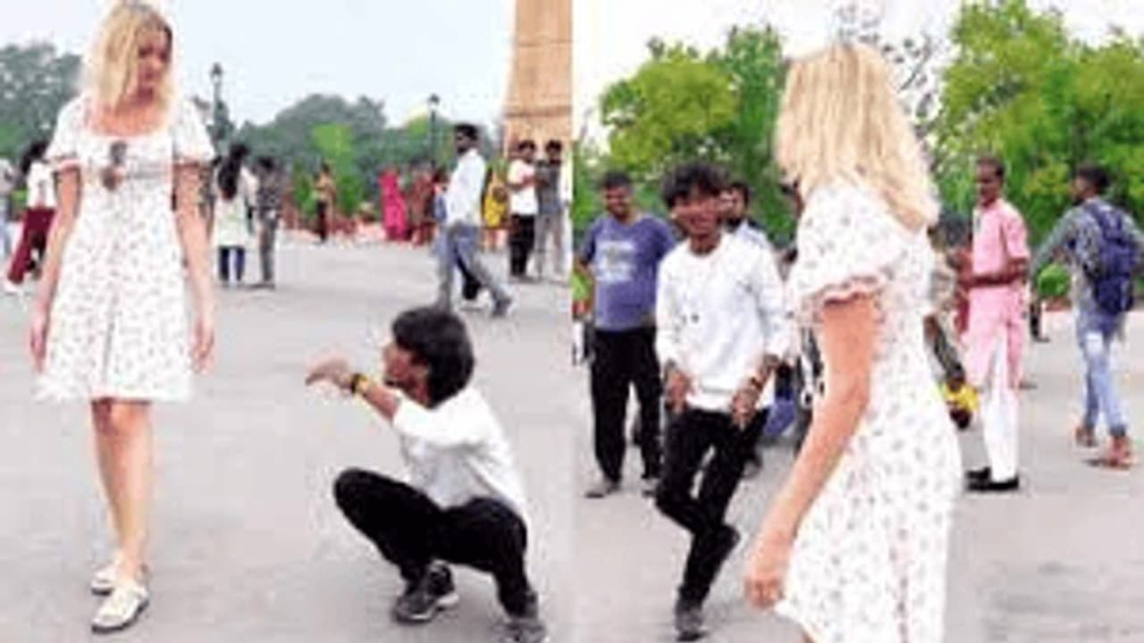 Man chases, dances around visibly uncomfortable Russian tourist at Delhi's India Gate, sparks outrage (WATCH) Man chases, dances around visibly uncomfortable Russian tourist at Delhi's India Gate, sparks outrage (WATCH)