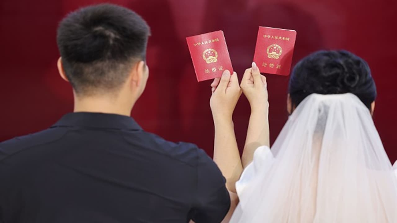 China's marriage registrations dip by almost a million in 2024 amid rising living costs & economic uncertainty China's marriage registrations dip by almost a million in 2024 amid rising living costs & economic uncertainty