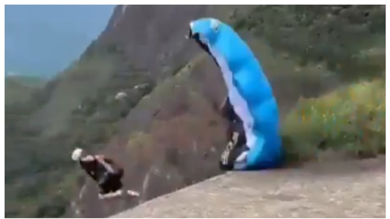 സ്കൈഡൈവിംഗിനായി ഓടവെ ഇൻസ്ട്രക്ടർ 850 അടി താഴ്ചയിലേക്ക് വീണ് മരിച്ചു; വീഡിയോ വൈറല്‍ 