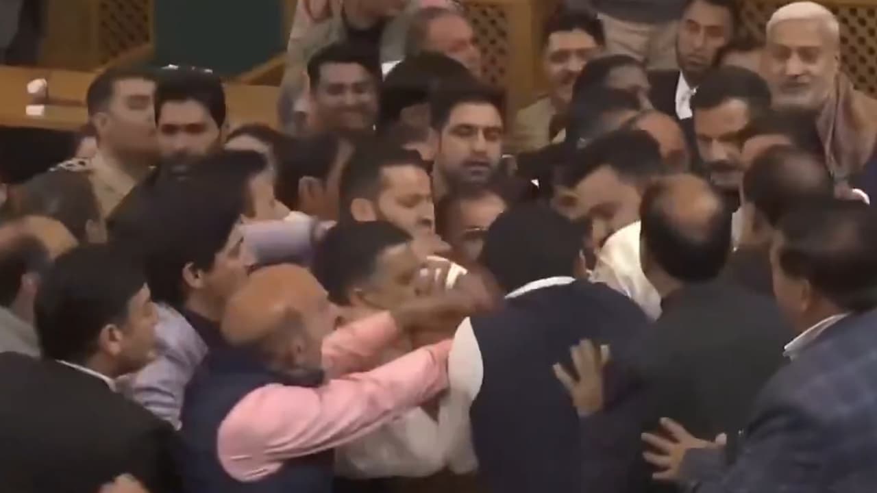 Jammu and Kashmir Assembly erupts over Article 370 restoration banner, fist fight breaks out (WATCH) Jammu and Kashmir Assembly erupts over Article 370 restoration banner, fist fight breaks out (WATCH)