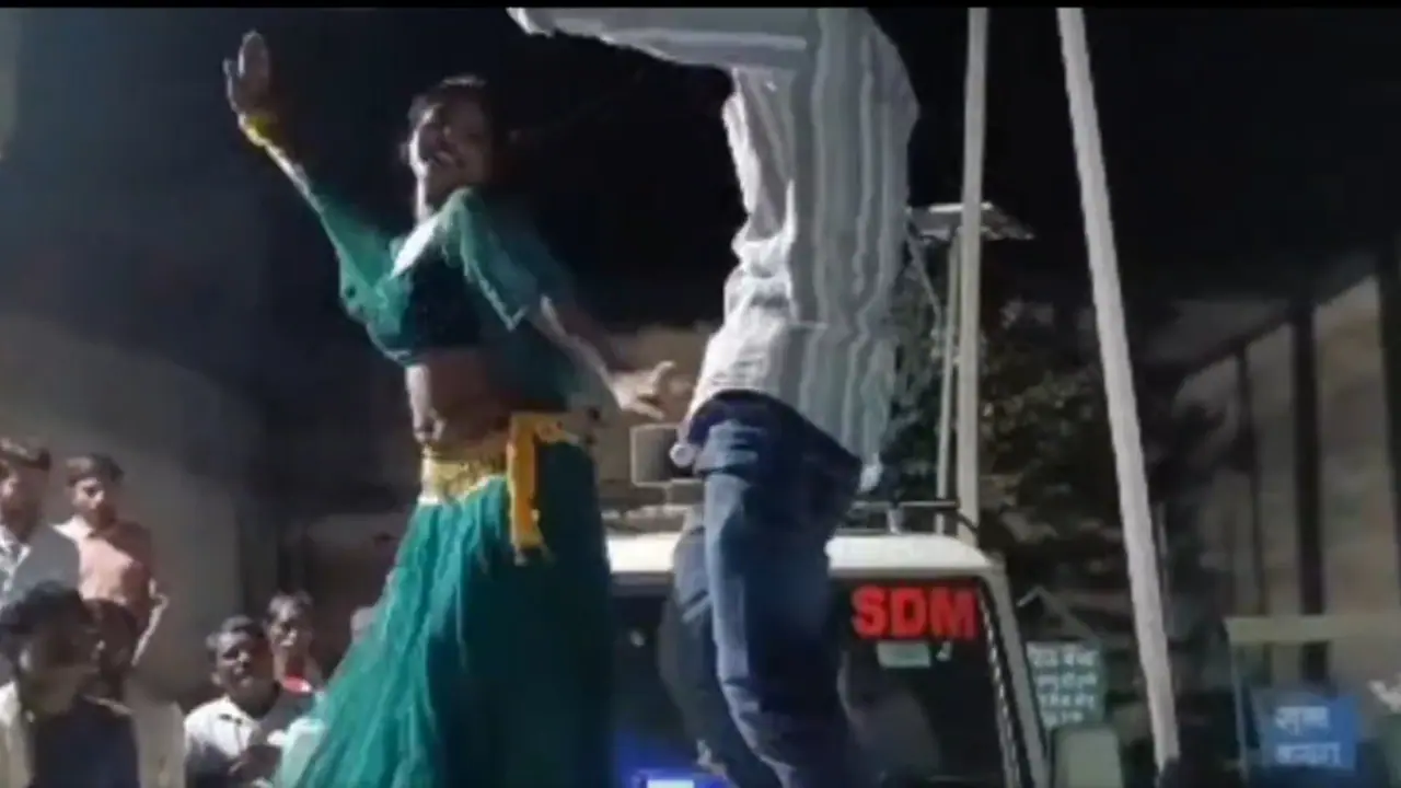 Woman's 'obscene' dance with man on bonnet of SDM's car in UP goes viral; FIR against driver (WATCH)