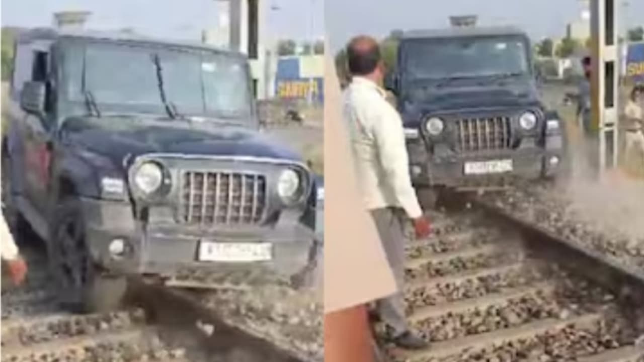 റീൽസെടുക്കാൻ ഥാർ ഓടിച്ചുകയറ്റിയത് റെയിൽവെ ട്രാക്കിൽ; ട്രെയിൻ വരുന്നത് കണ്ടിട്ടും വണ്ടി മാറ്റാൻ കഴിഞ്ഞില്ല