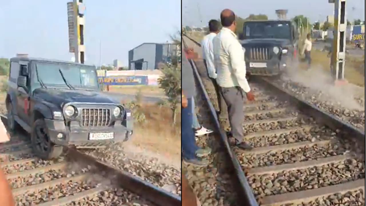 ರೈಲು ಬರುತ್ತಿದ್ದ ಹಳಿಯಲ್ಲೇ ಥಾರ್ ಕಾರು ನುಗ್ಗಿಸಿದ ಕುಡುಕ, ಬಳಿಕ ನಡೆದಿದ್ದೇ ಅಚ್ಚರಿ!